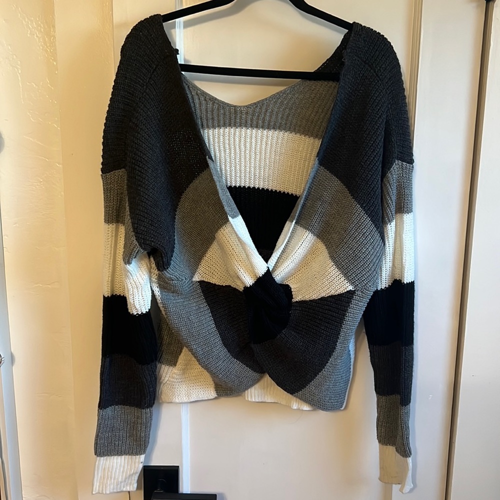 Off shoulder twist sweater